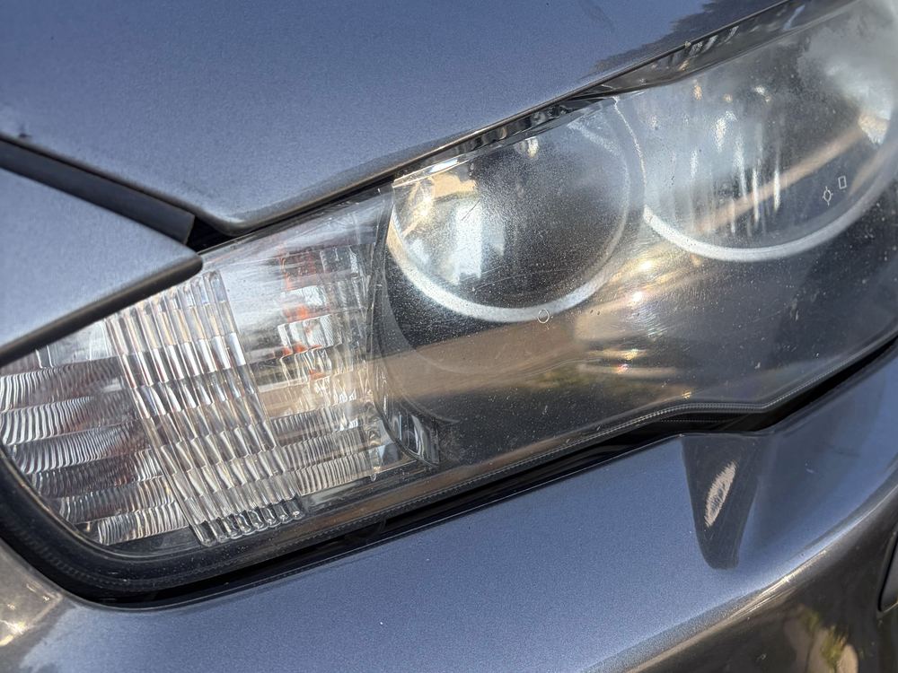 Mitsubishi Lancer · lewa lampa — przed regeneracją